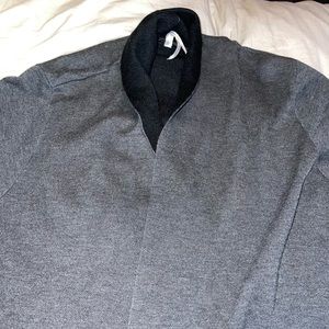 size L Leo and Nicole cardigan with a slit down each side.